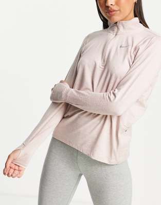 Nike Running Dri-FIT half-zip long sleeve top in pale pink