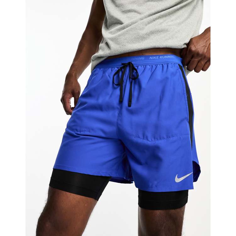 fusion udslettelse bånd Nike Running Dri-FIT hybrid shorts in blue | ASOS