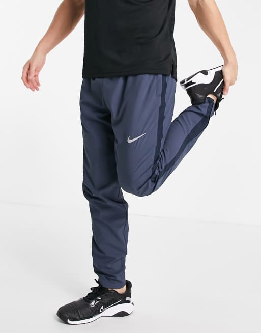 Nike Running Dri FIT Jogger tisse Bleu fonce