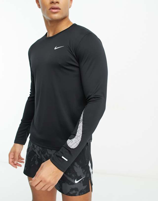 Nike Running Dri-FIT long sleeve top in black