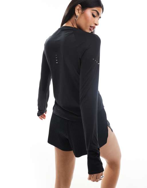 Nike Running Dri-FIT long sleeve top in black, 3 of 4