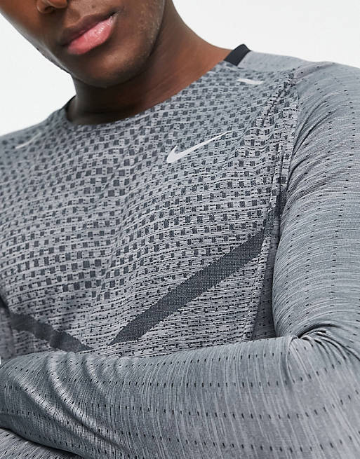 nægte Sammenligning Awakening Nike Running Dri-FIT long sleeve top in gray | ASOS