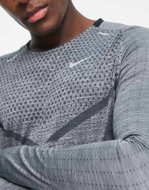 https://images.asos-media.com/products/nike-running-dri-fit-long-sleeve-top-in-gray/203386011-3?$n_640w$&wid=513&fit=constrain