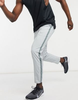 Nike Running Dri-FIT Run Stripe sweatpants in grey