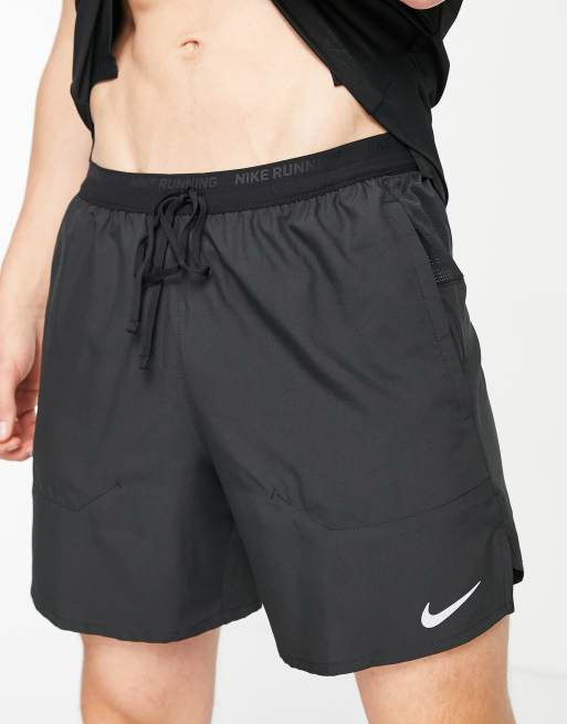 middernacht explosie boete Nike Running Dri-FIT Stride 2-in-1 7-inch shorts in black | ASOS