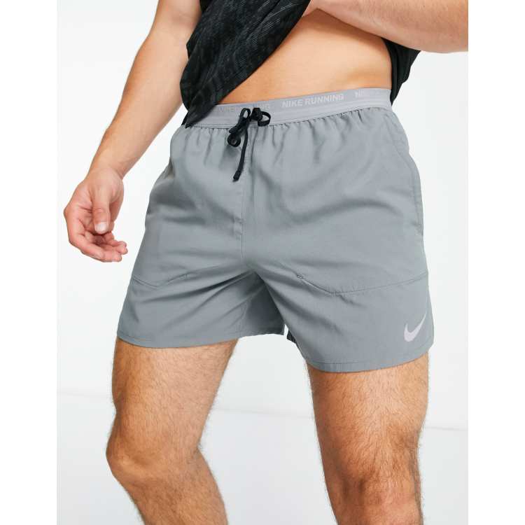 Escrupuloso estoy sediento viuda Nike Running Dri-FIT Stride 5-Inch brief-lined shorts in gray | ASOS