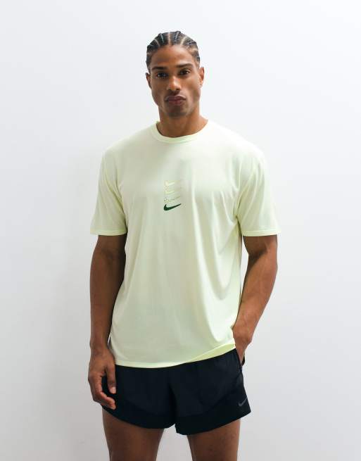 Nike Running Dri-Fit Strides T-shirt in lime green, 3 of 5