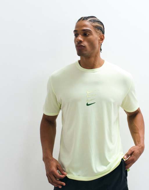 Nike Running Dri-Fit Strides T-shirt in lime green, 5 of 5