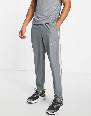 Nike Running Dri-FIT Stripe woven pants in gray-Grey