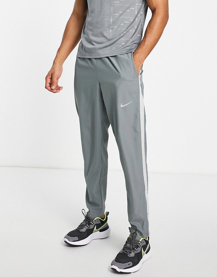 Nike Running Dri-FIT Stripe woven pants in gray-Grey