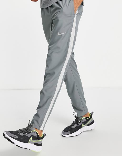 Nike Running Dri-FIT Stripe woven pants in gray