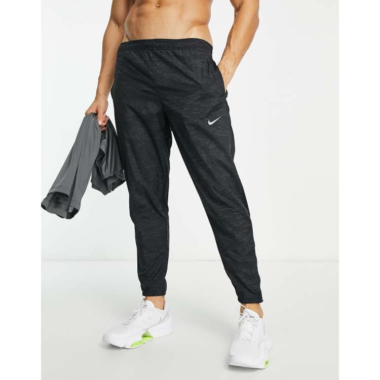 Nike Running Dri-FIT sweatpants in black