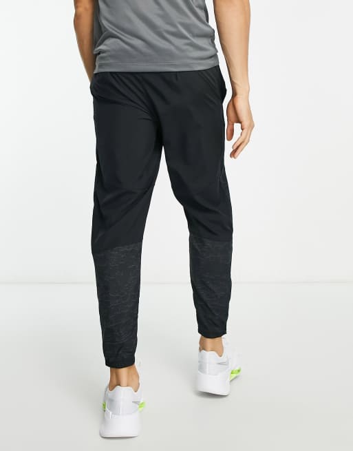 Nike Running Dri-FIT sweatpants in black