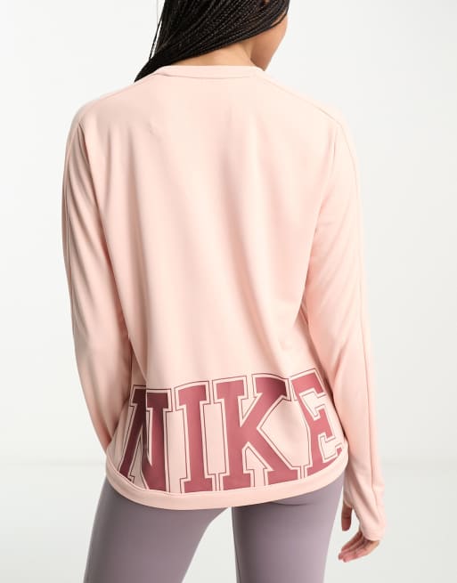 Nike Running Dri FIT Swoosh midlayer top in pink ASOS