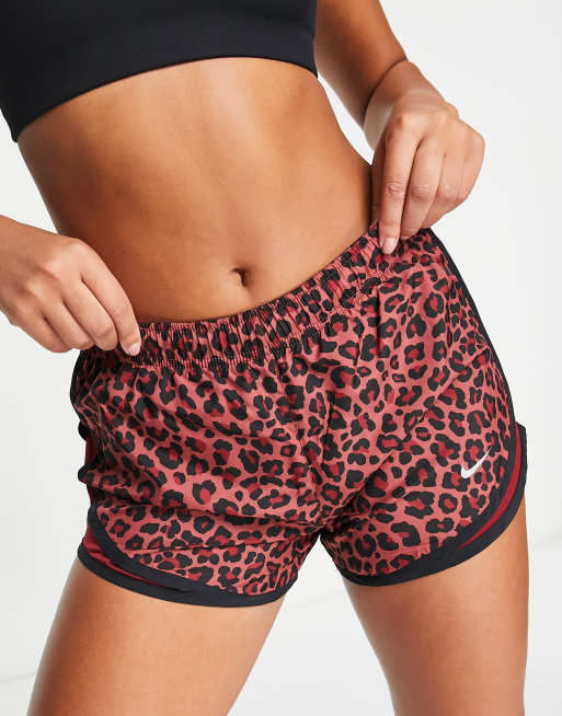 Nike Running Dri FIT Tempo leopard print shorts in red