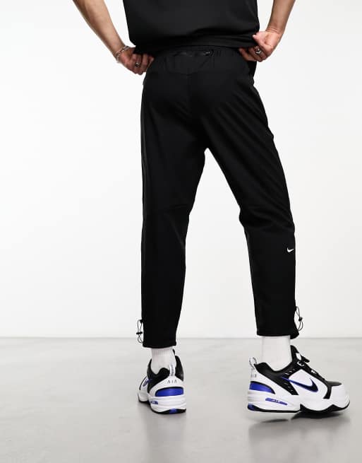 Nike Running Dri-FIT sweatpants in black