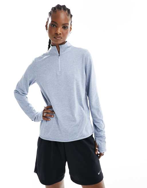 Nike Running Element Dri Fit half zip mid layer long sleeve jacket in light blue