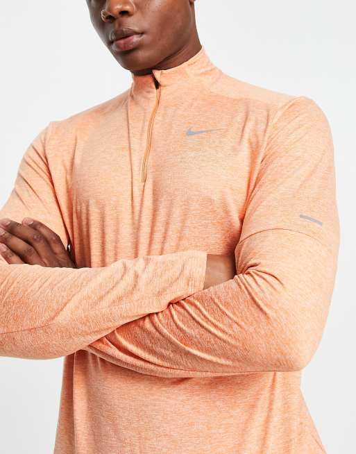 Nike Running Element Dri FIT half zip top in peach