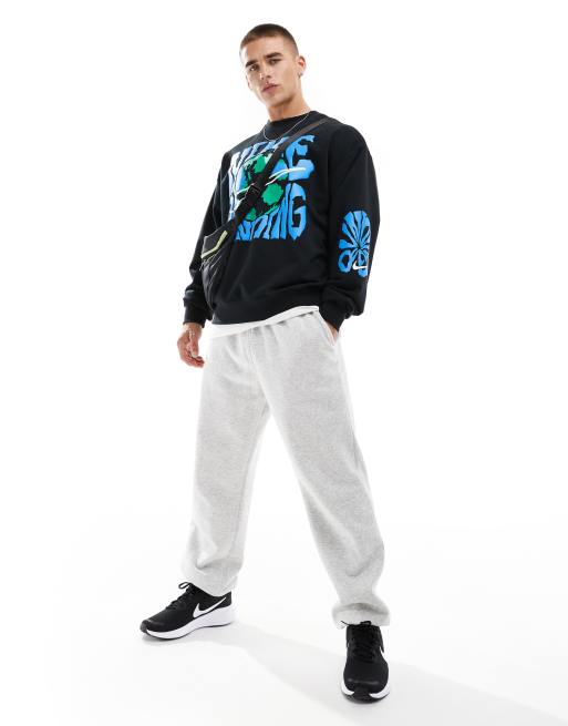 Nike Running Energy graphic sweatshirt in black | ASOS