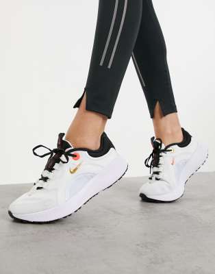 Nike Running Escape Run trainers in white and gold | ASOS