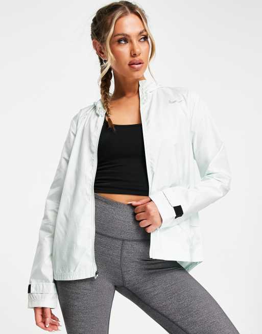 Nike Running Essential jacket in light green | ASOS