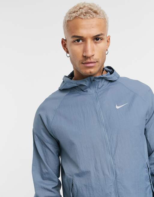 Veste nike grise store et bleu femme