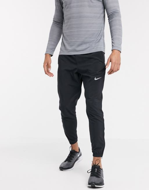 Nike essential woven cheap running pants