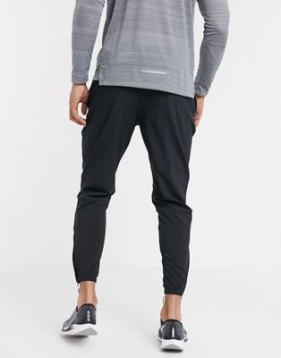nike essential woven track pants