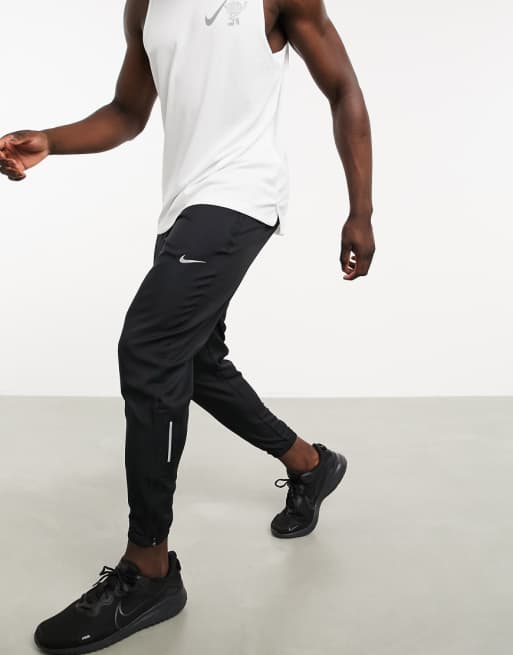 Nike Running essential woven pants in black | ASOS