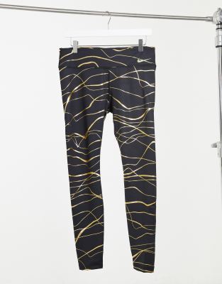 Nike Icon Clash Fast Tight Leggings In Black And Gold