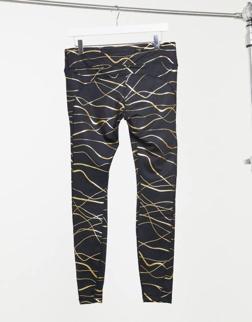 Nike Running Fast Tight leggings in black and gold