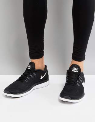 nike running flex 2017 trainers in black