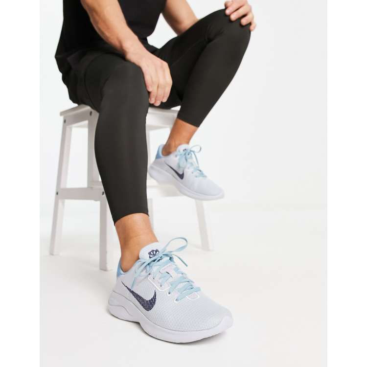 Light blue nike running on sale shoes