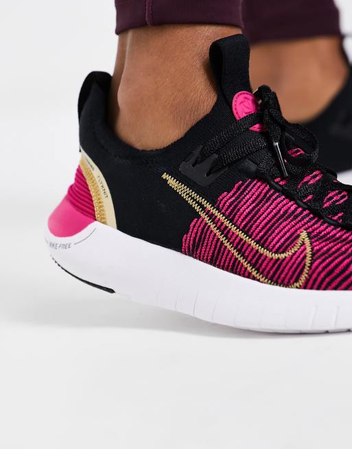 Black and pink nike free sale