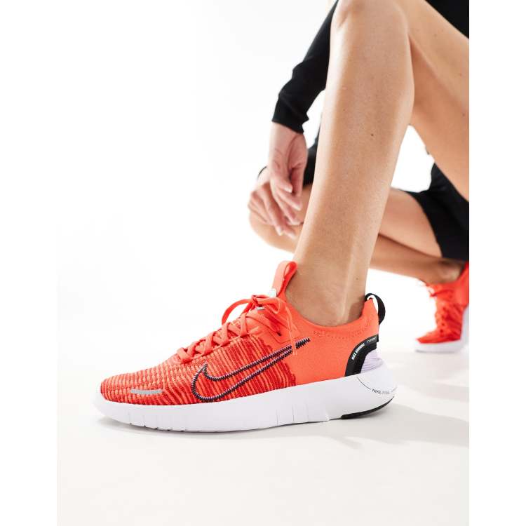 Nike Running Free Run NN sneakers in bright red ASOS
