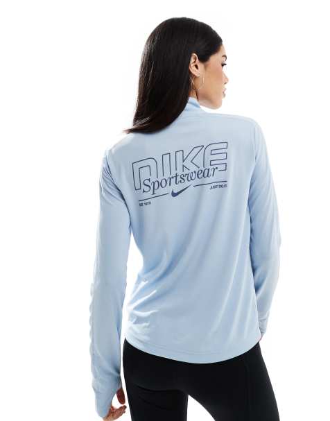 Nike Running Gym Life Swoosh Pacer Dri-FIT 1/4 zip long sleeve top in light blue - view 1