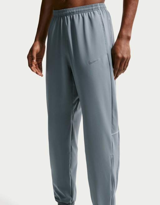 Nike Running heren Miler Dri-FIT geweven broek in grijs, 2 van 4