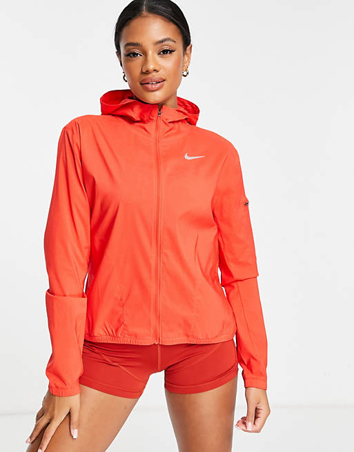 director Conclusión Perca Nike Running Impossibly Light hooded jacket in light crimson | ASOS