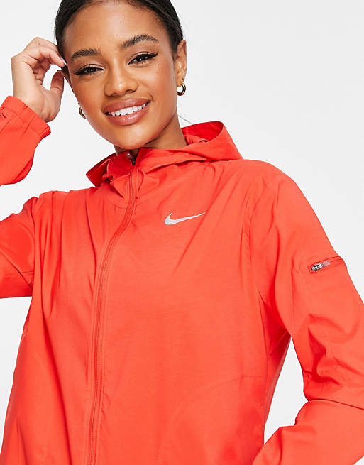 Nike Impossibly Light hooded jacket in light crimson ASOS