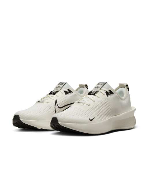 Nike Running Interact Run SE sneakers in off white