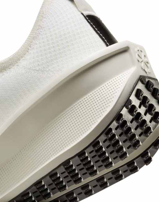 Nike Running Interact Run SE sneakers in off white