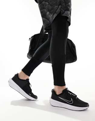 black and white nike track shoes