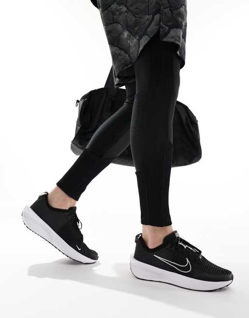 Nike Running Interact Run sneakers in black and white