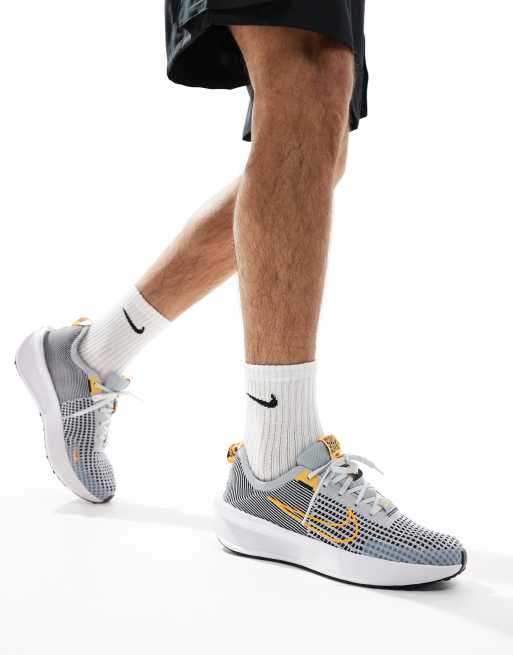 Nike grey and gold trainers best sale