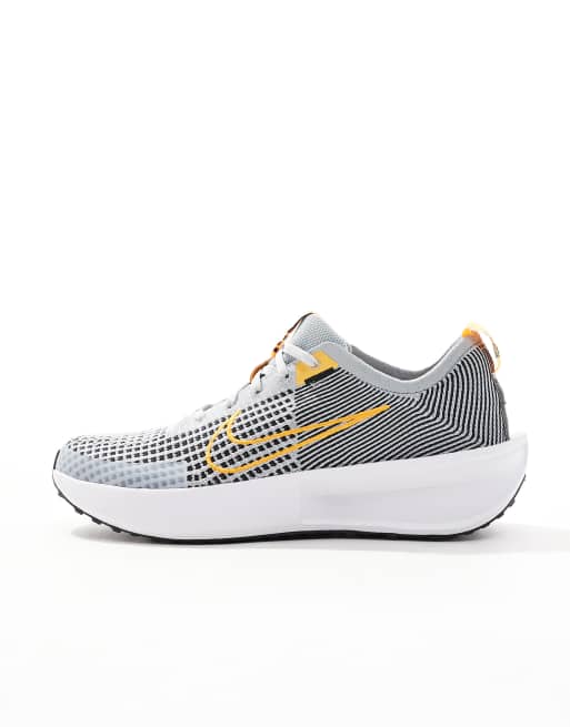Nike Running Interact Run sneakers in gray and orange | ASOS display picture 1