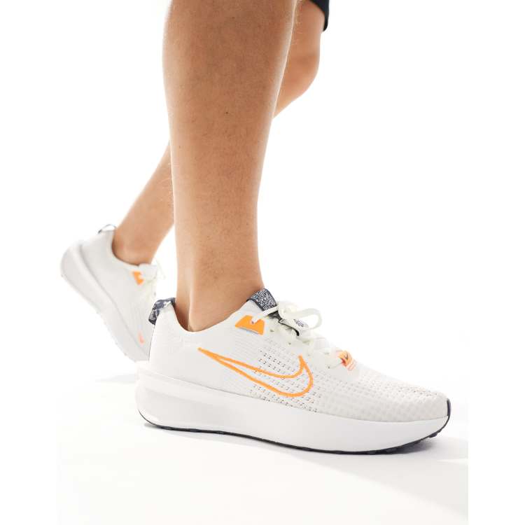 Nike free orange and white best sale