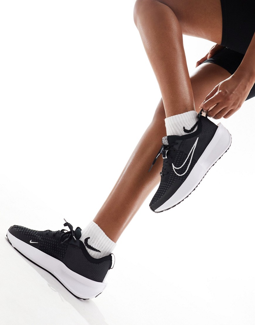Nike Running Interact Run trainers in black and white