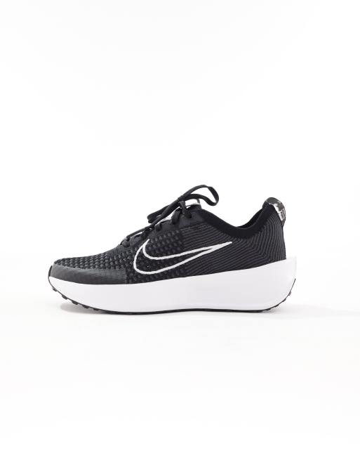 Nike Running Interact Run trainers in black and white ASOS