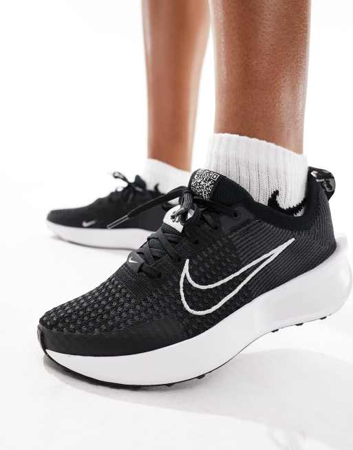 Black nike trainers with white tick best sale