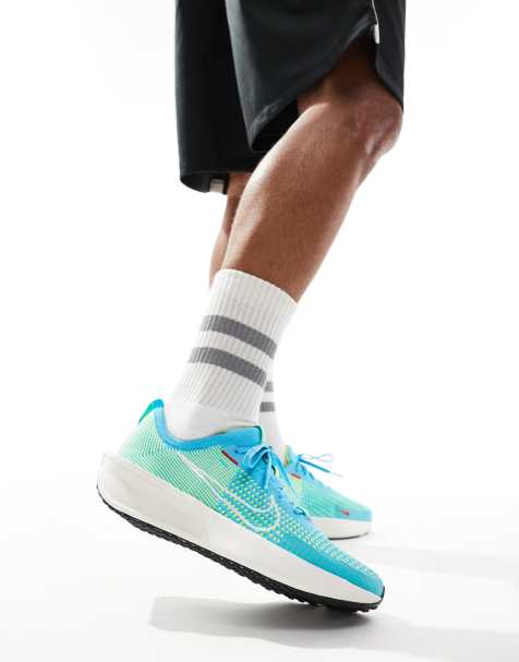 Nike Running Interact Run trainers in blue - view 1